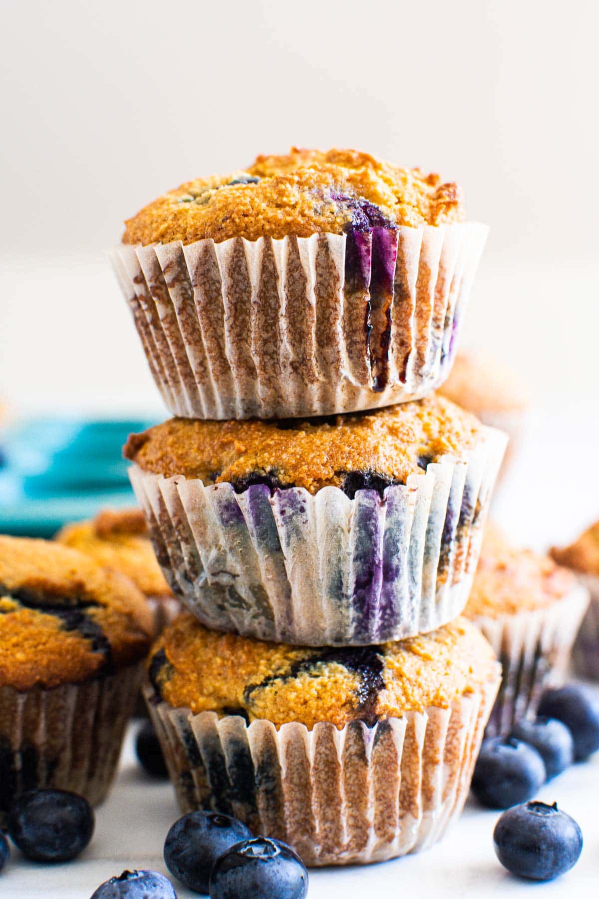 Stack of almond flour blueberry muffins.