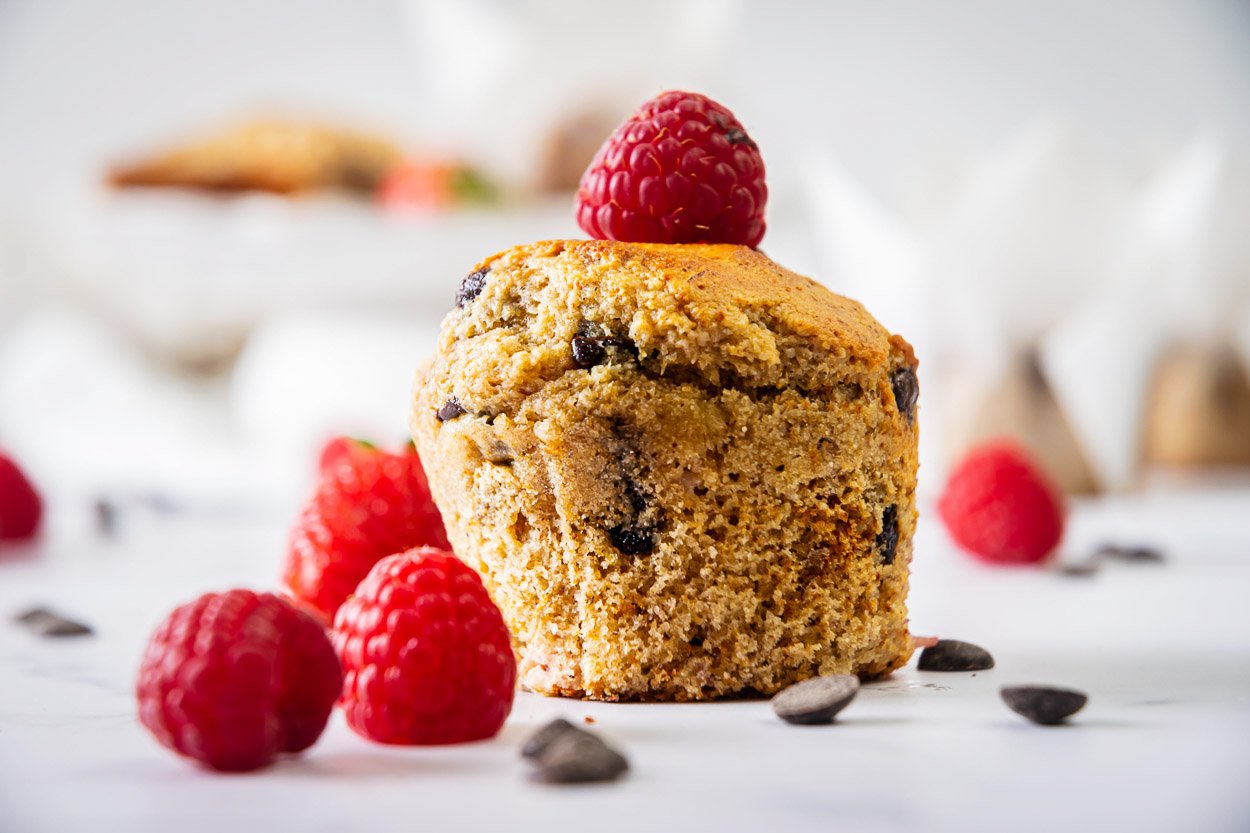 Banana protein muffins with raspberries and chocolate chips.