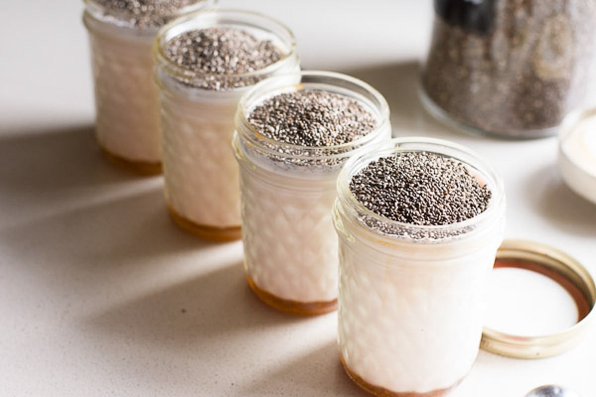 Chia seeds added on top of almond milk, maple syrup and vanilla extract.