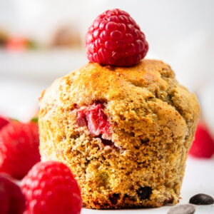 banana protein muffins with a raspberry on top