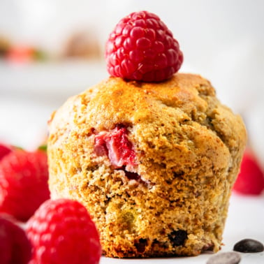 banana protein muffins with a berry on top