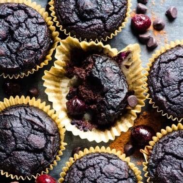Double chocolate coconut flour muffins with cherries and chocolate chips.