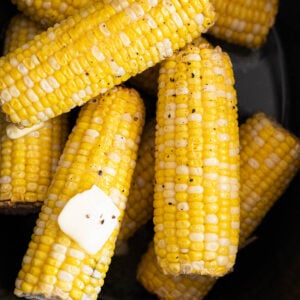 Cooked corn on the cob in the crock pot with a pat of butter and ground black pepper.