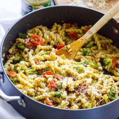 healthy pasta recipe in a skillet with serving spoon