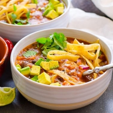 chicken tortilla soup in instant pot with diced avocado