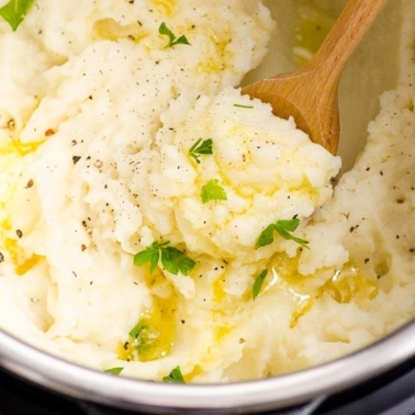 instant Pot Mashed Potatoes with a spoon dipped into them