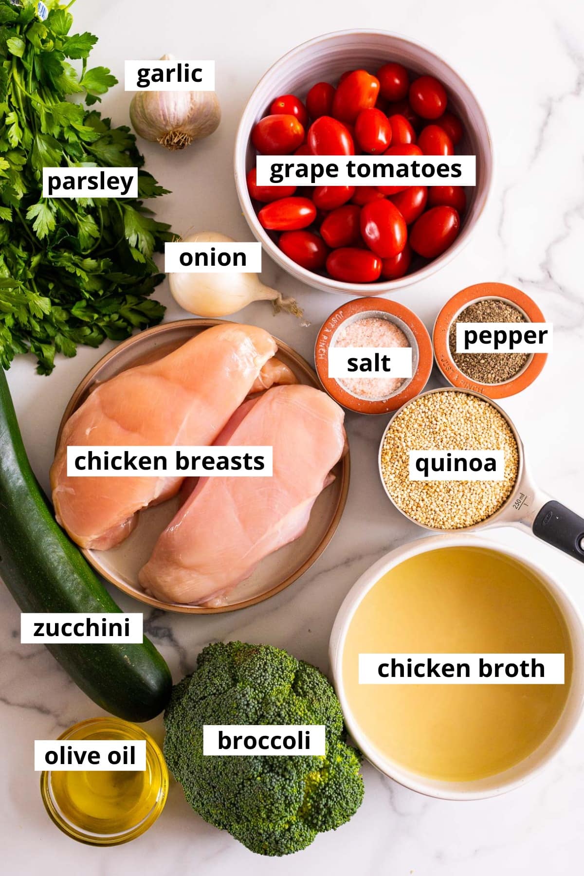 Chicken breasts, grape tomatoes, onion, garlic, parsley, zucchini, quinoa, broccoli, chicken broth, olive oil, salt and pepper.