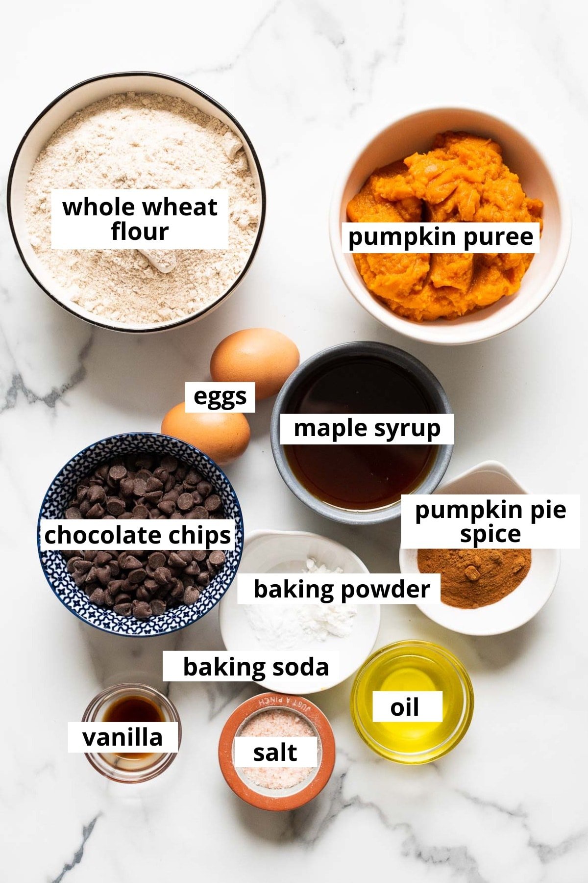Pumpkin puree, whole wheat flour, maple syrup, eggs, chocolate chips, pumpkin pie spice, baking powder, baking soda, vanilla, oil and salt.