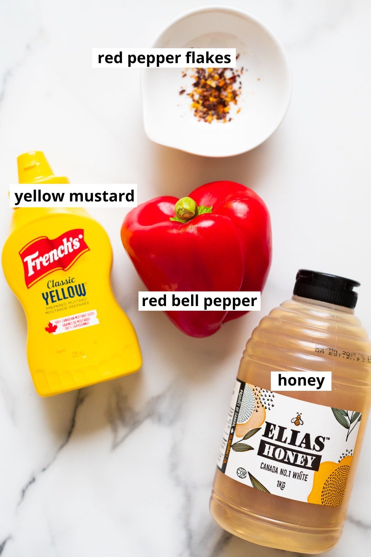 Red bell pepper, red pepper flakes, yellow mustard, honey.