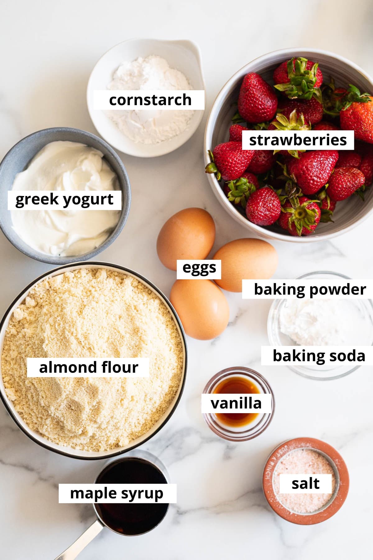 Strawberries, cornstarch, Greek yogurt, eggs, almond flour, baking powder, baking soda, vanilla extract, maple syrup, salt.