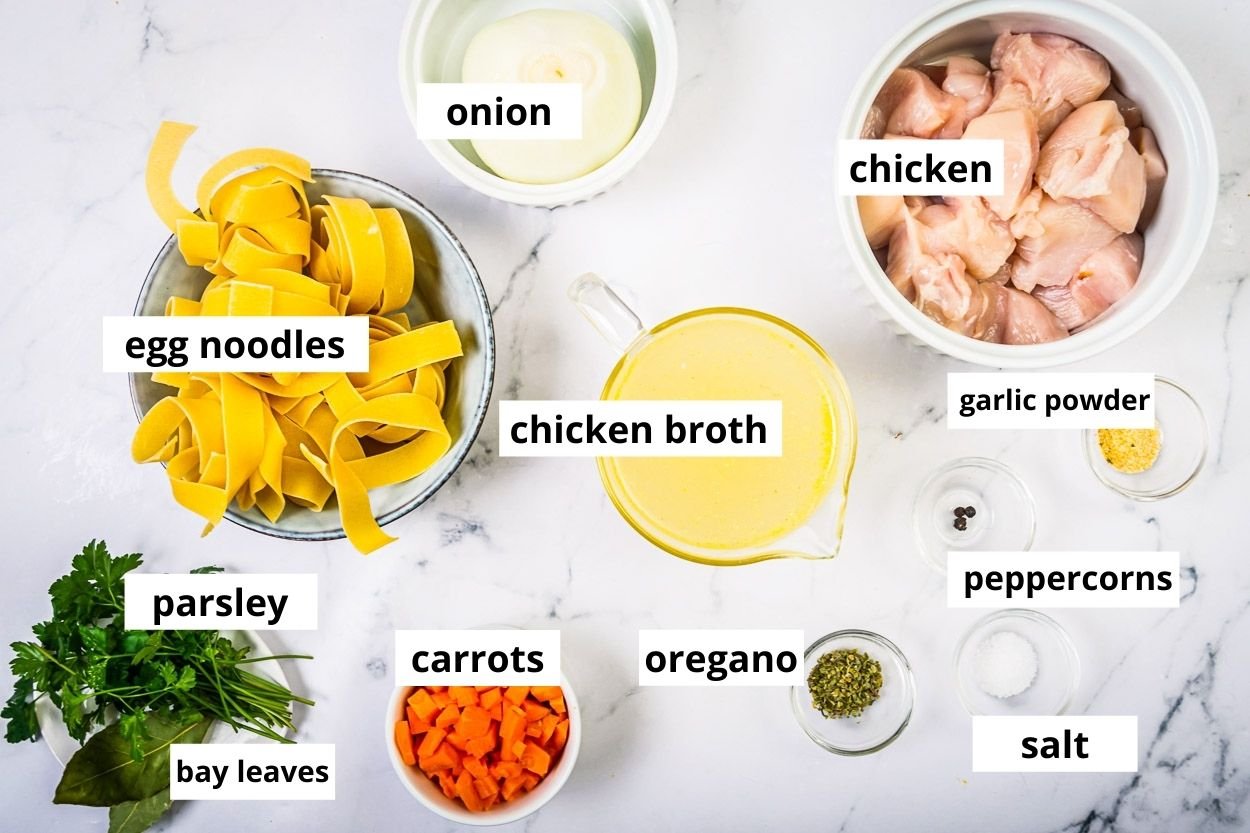 Chicken breasts, egg noodles, onion, chicken broth, garlic powder, peppercorns, carrots, parsley, oregano, salt and bay leaves.