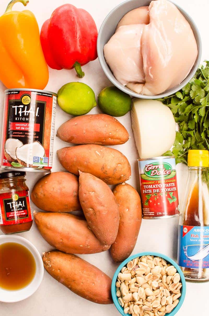 Instant Pot Thai Chicken Soup ingredients include sweet potato, chicken breasts, coconut milk, bell pepper, lime, red curry paste