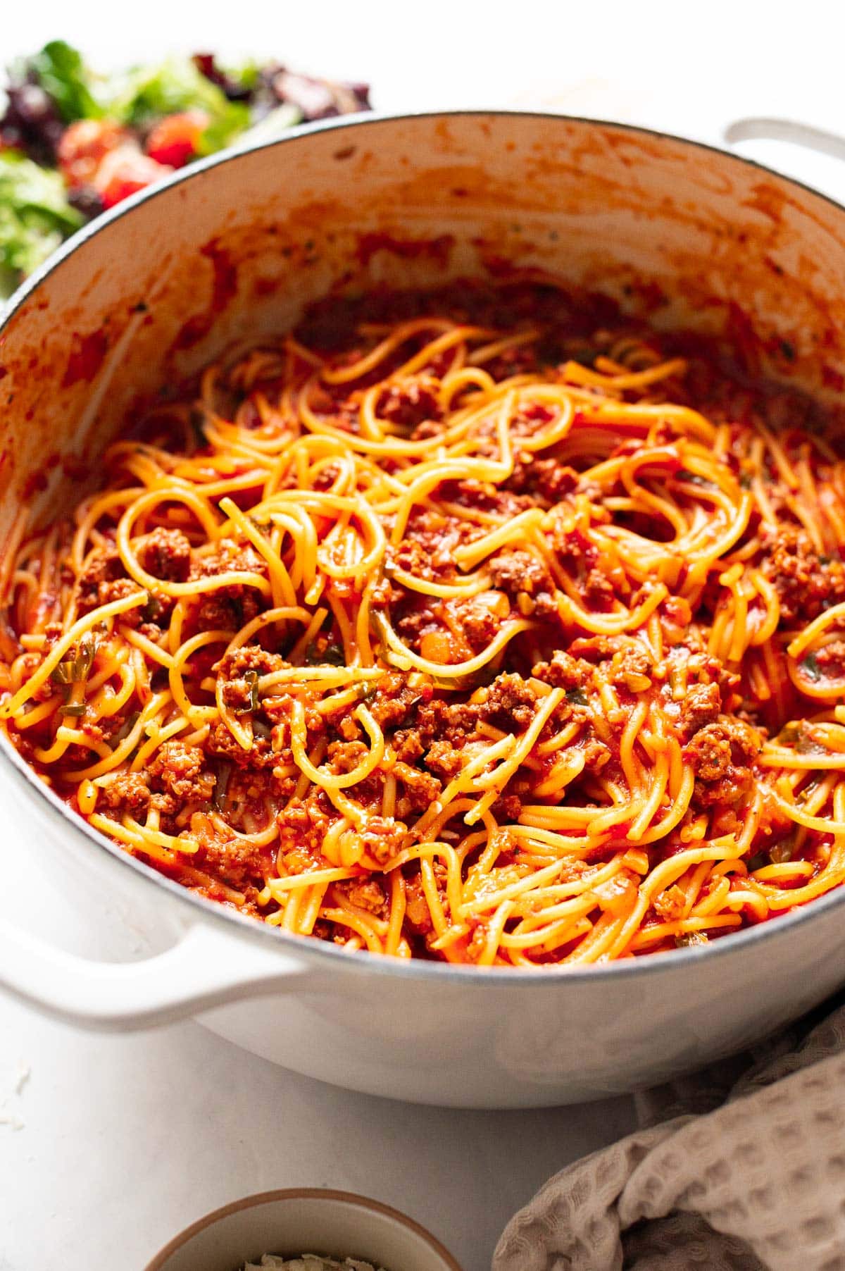 Spaghetti with meat sauce in a pot.